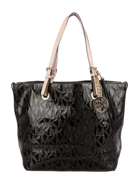 michael kors buhhda|Michael Kors leather tote.